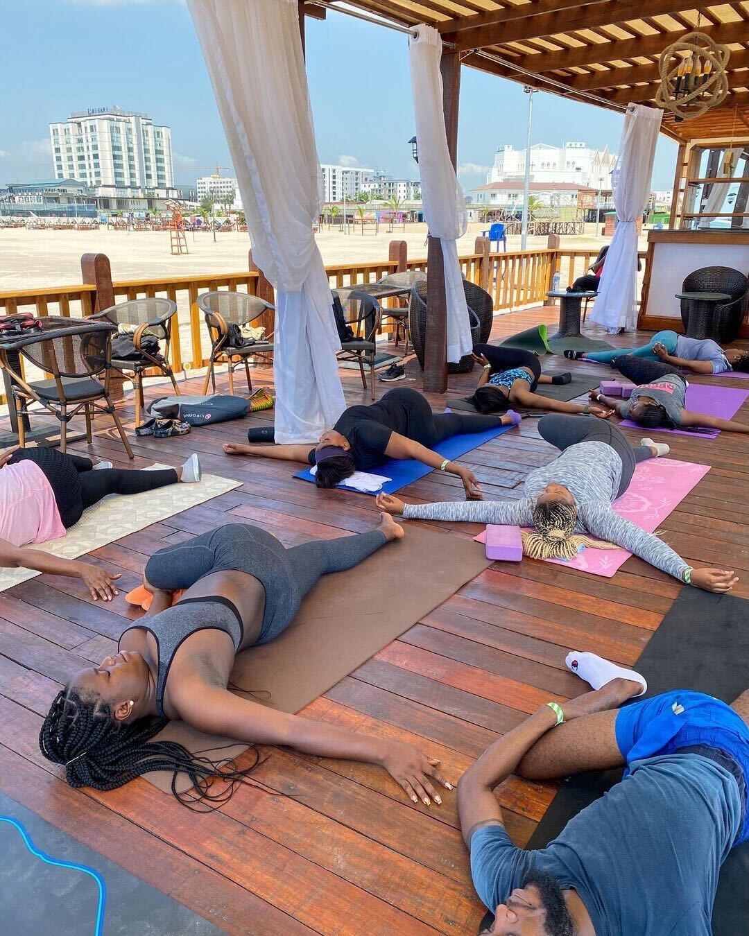 A private session with Good Faith Yoga at the beach