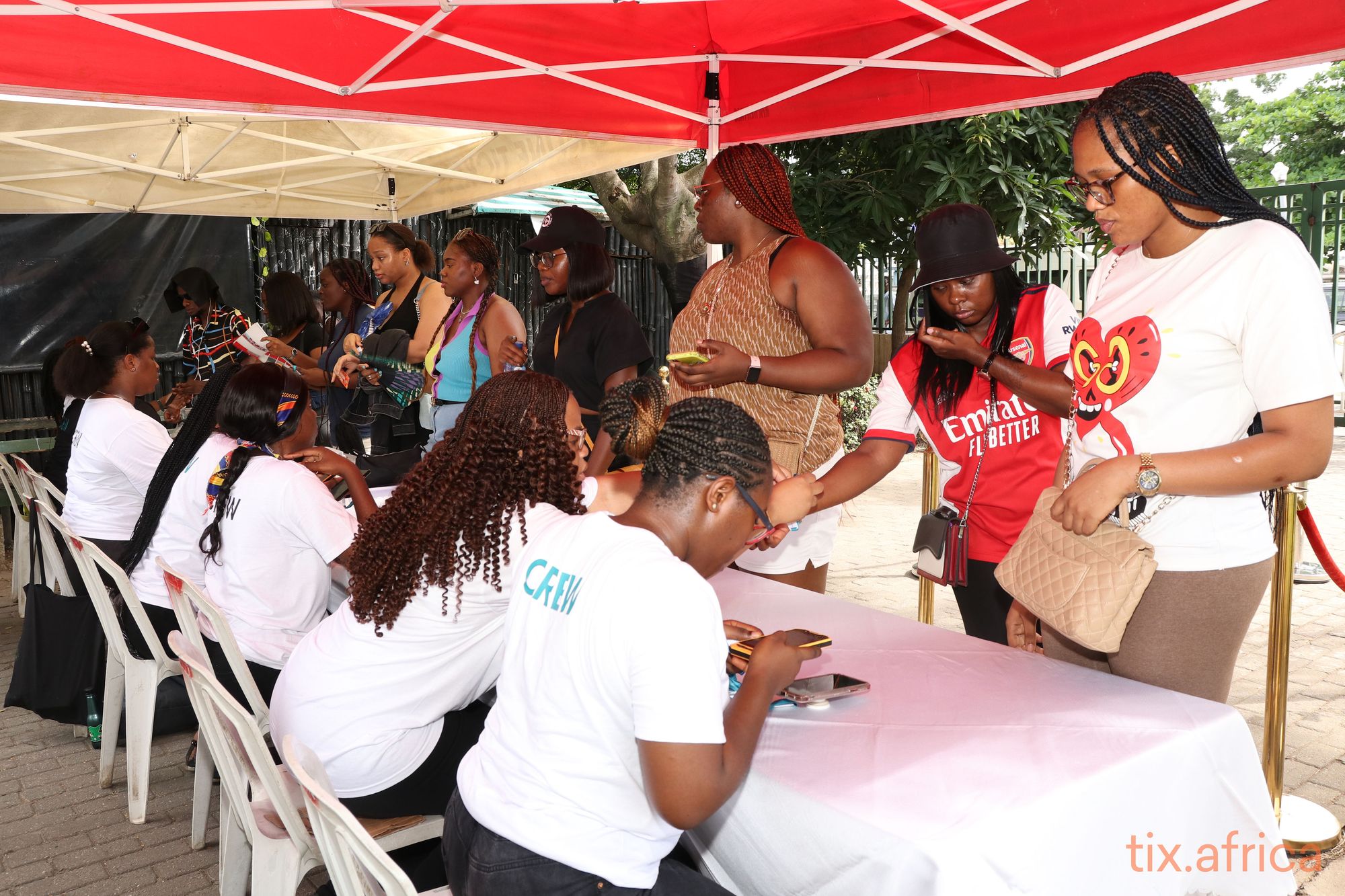 Tix event support staff scanning general admission attendee tickets at Tixieland 2022